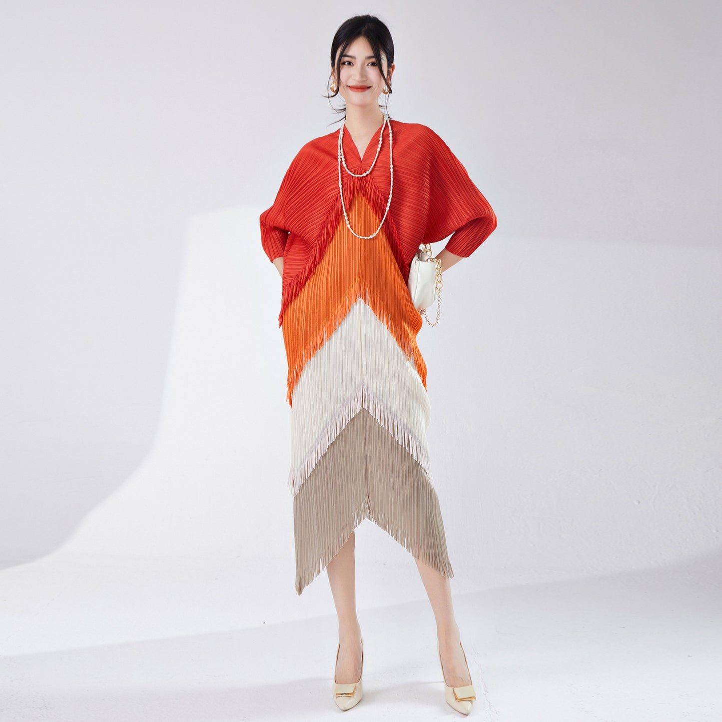 2025 hot-selling dress spring and summer women's design sense contrasting colors tassel irregular loose large-size temperament skirt Popularan goods