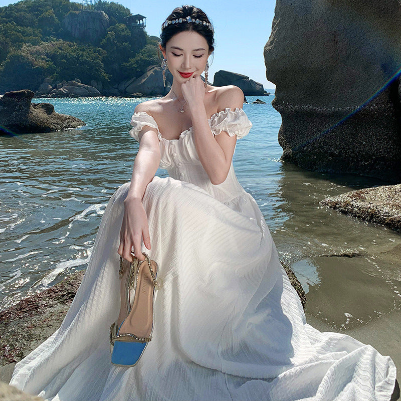 2025 Muse white dress summer atmosphere seaside photo Egyptian vacation style one-word collar halter waist dress