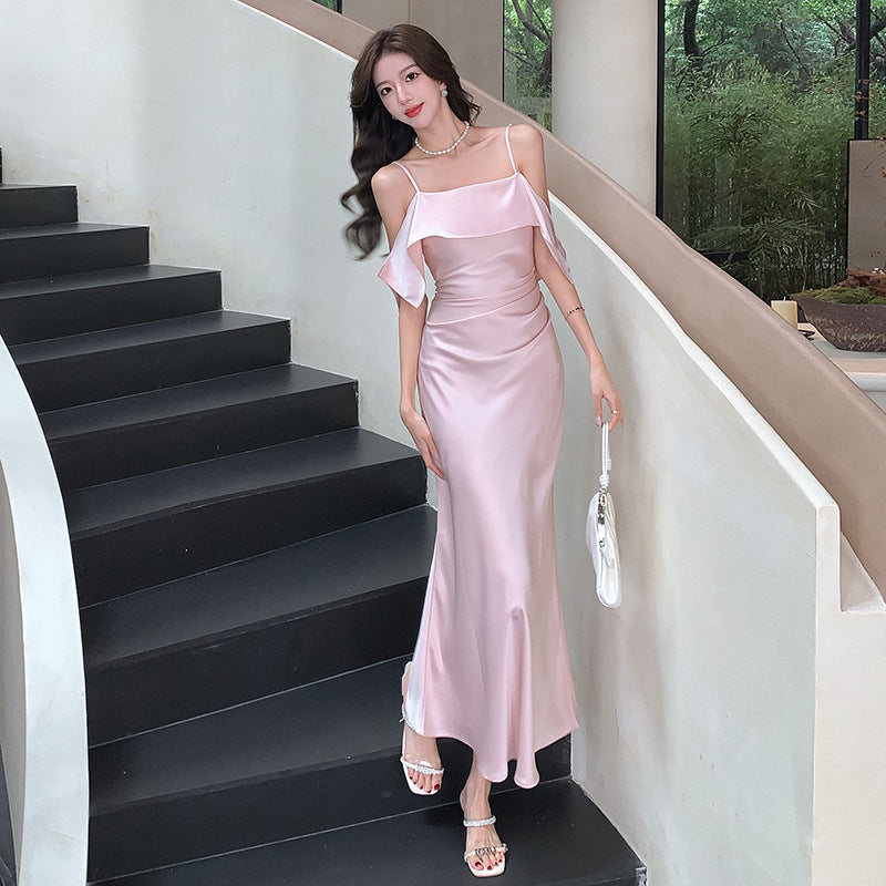 2025 spring and summer suspender one-word shoulder satin suspender dress women's pleated waist and thin fishtail dress