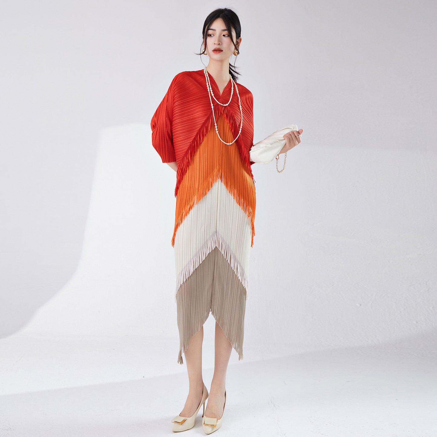2025 hot-selling dress spring and summer women's design sense contrasting colors tassel irregular loose large-size temperament skirt Popularan goods